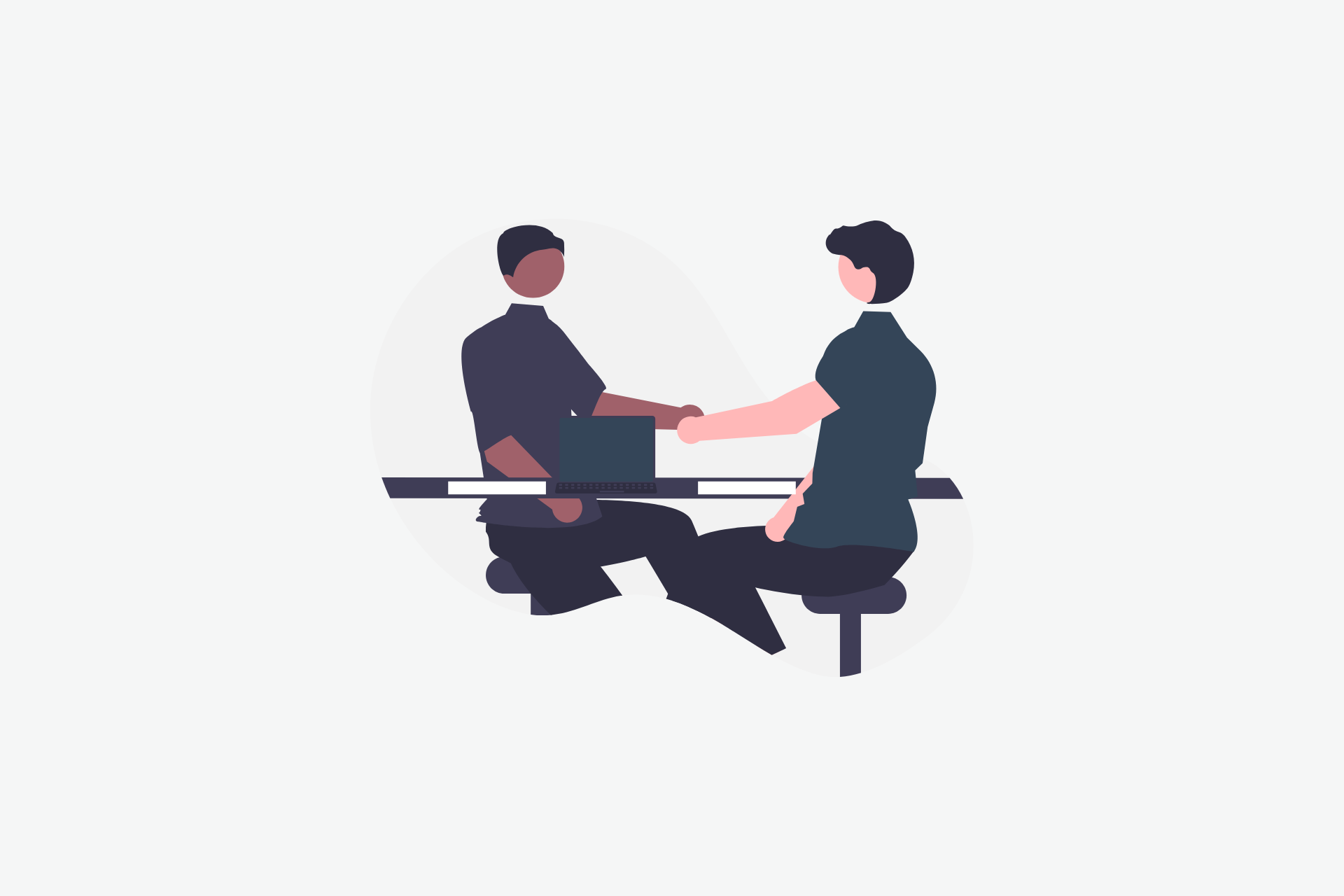 A individuals sat at a table shaking hands representing a negotiation taking place